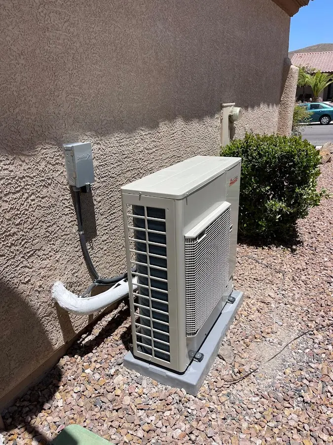 Residential air conditioning condenser unit in Carroll